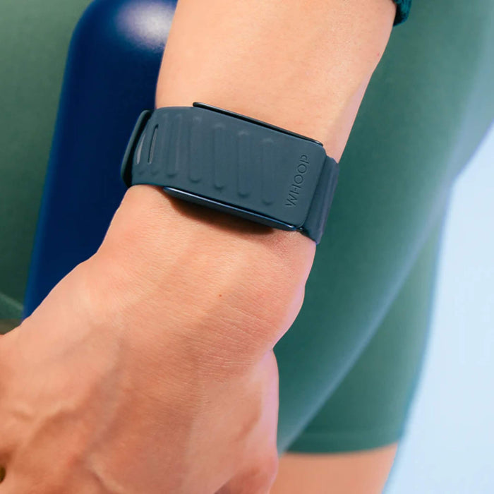 Close-up of Whoop SportFlex Silicone Band in Dash color, showcasing durable soft-touch silicone and adjustable closure for performance and comfort.