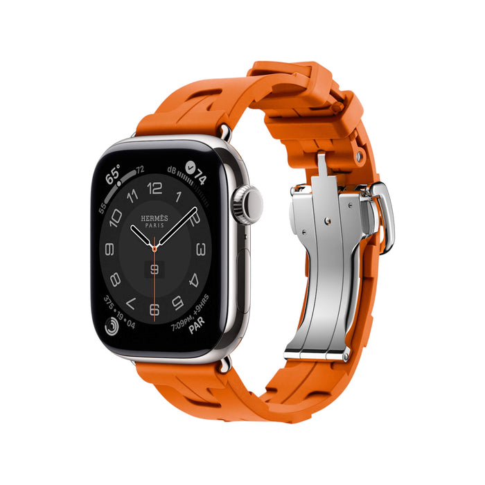 Apple Watch Hermès S10, 42mm silver titanium with Orange Kilim band, combining luxury and vibrant style in Qatar from TaMiMi Projects.